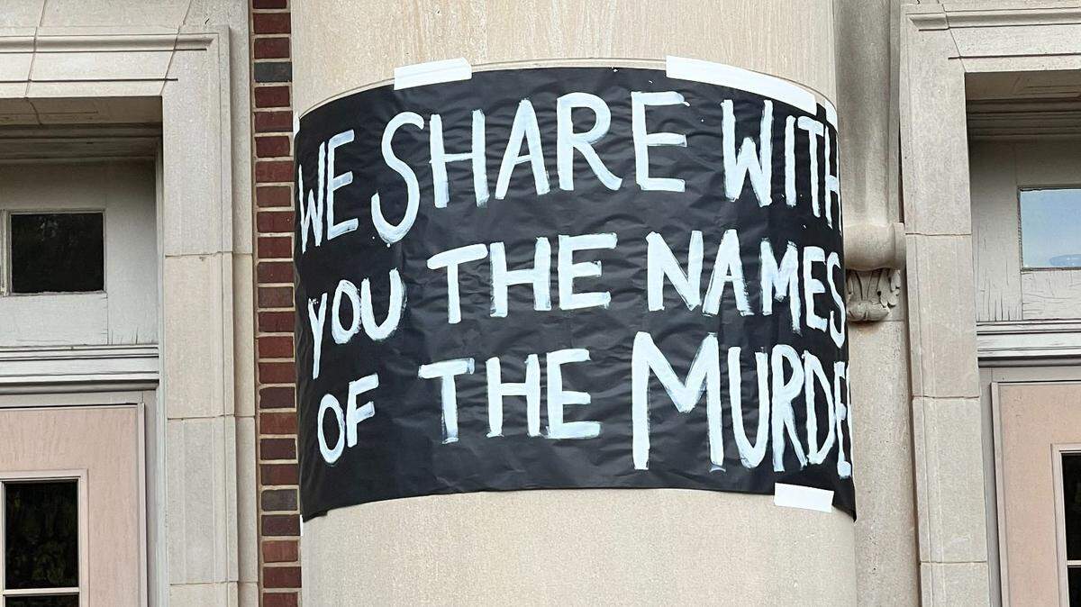 At Davidson College near Charlotte, a group of students printed the names of thousands of victims of the Israel-Hamas war in Gaza. In the middle of the night, they taped them on the walls of the Chambers Building, the main academic building on campus. They posted this sign at one of the entrances.