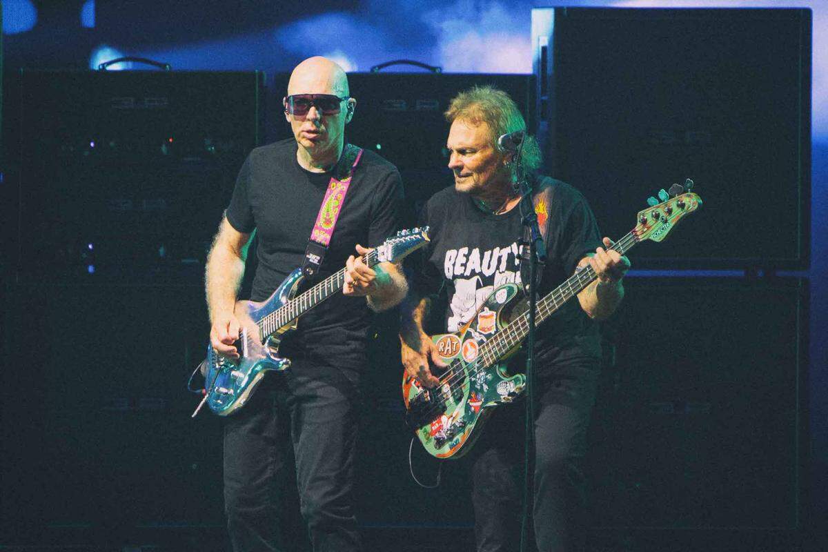 Joe Satriani and Michael Anthony perform at PNC Music Pavilion in Charlotte on Friday night.