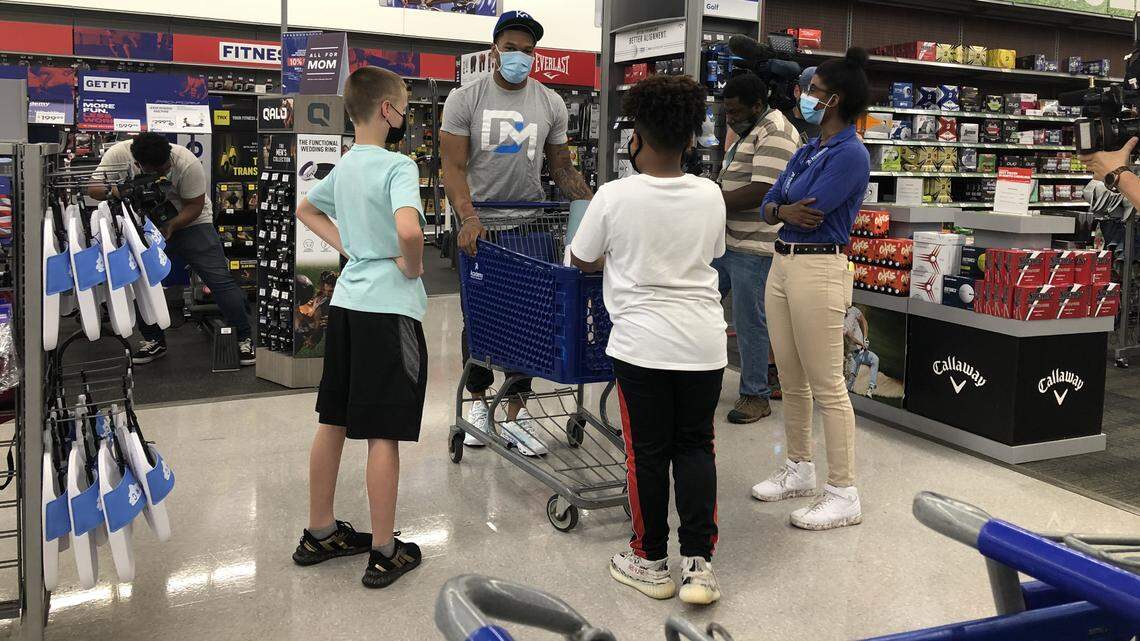 Carolina Panthers wide receiver DJ Moore at his foundation’s Mother’s Day Celebration event. He helped Charlotte-area children pick out gifts for their mothers.
