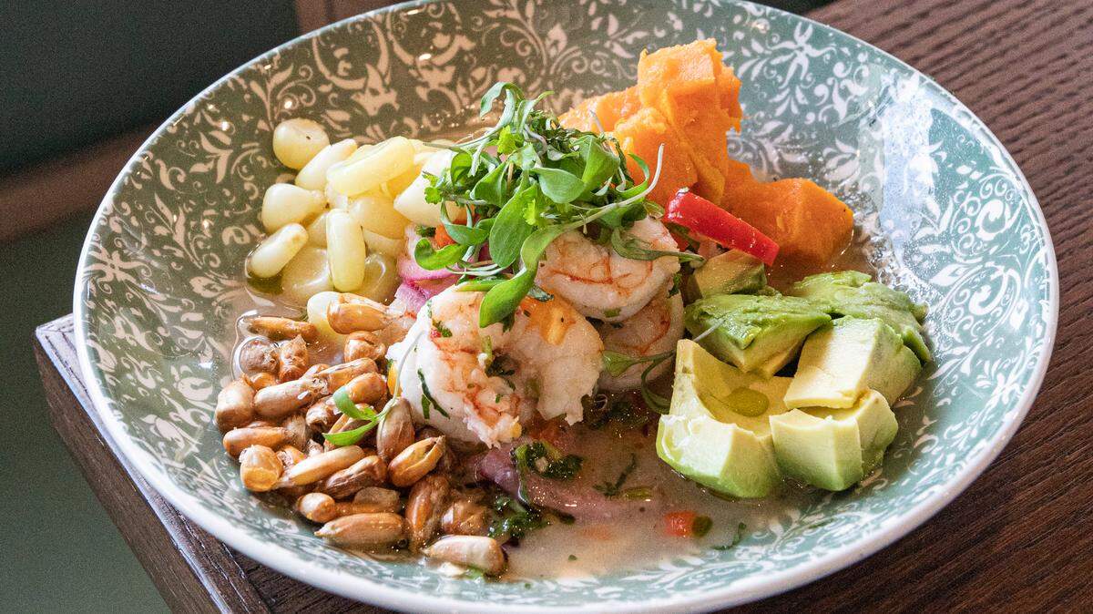 Calle Sol’s Caliente Ceviche is served warm with sweet potato, corn and avocado.
