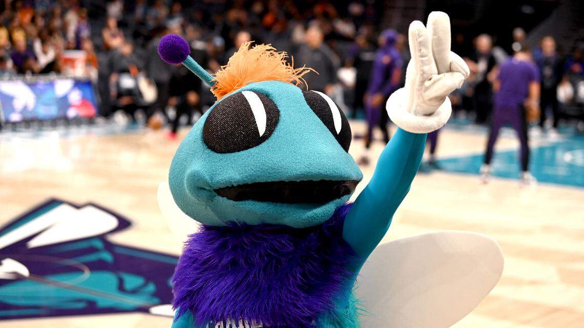 Charlotte Hornets mascot Hugo motions to the fans as he walks along the court at Spectrum Center in Charlotte, NC on Friday, March 15, 2024. The Hornets hosted the Suns in NBA action.