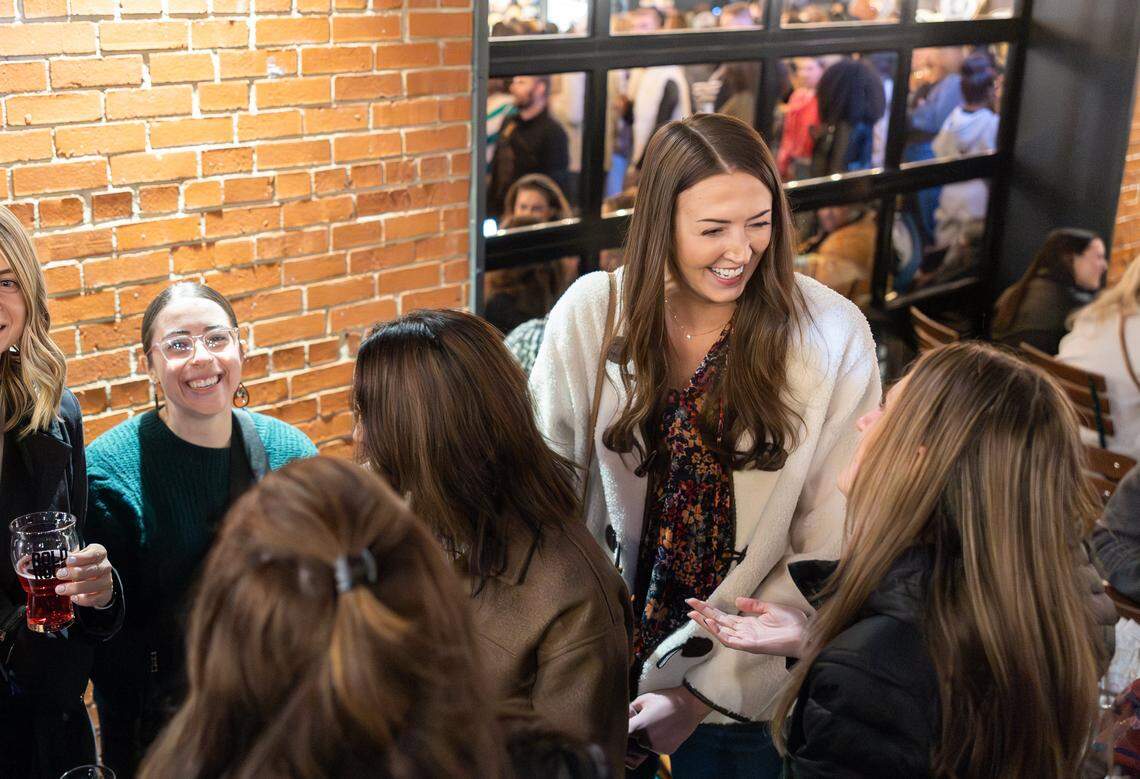 A group of women at the Tall Tour event at Brewers At 4001 Yancey in Charlotte, N.C., on Saturday, December 6, 2025.