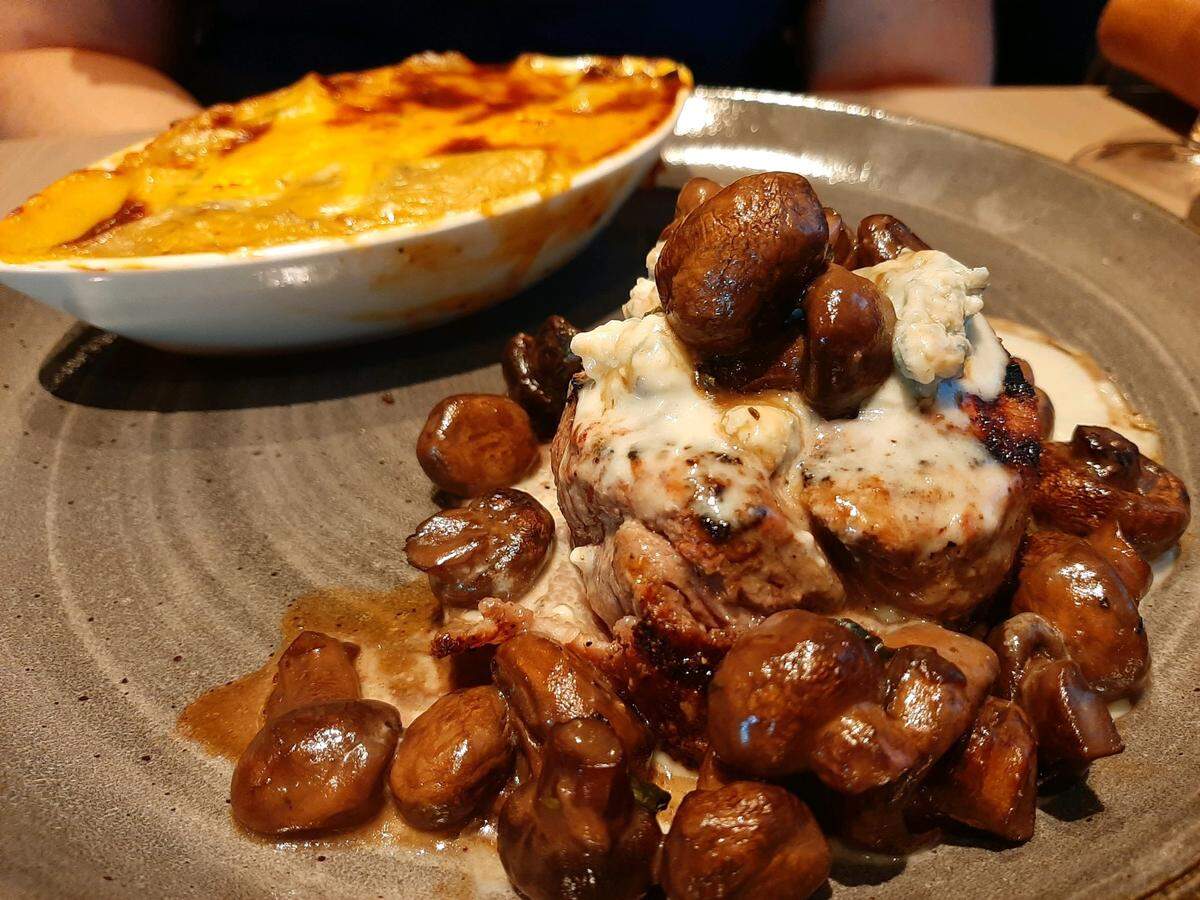 The blue cheese filet topped with mushroom is one of the new entrees at Firebirds Wood Fired Grill, now open in Fort Mill.