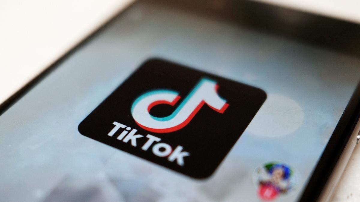 The TikTok logo on a smartphone in Tokyo.