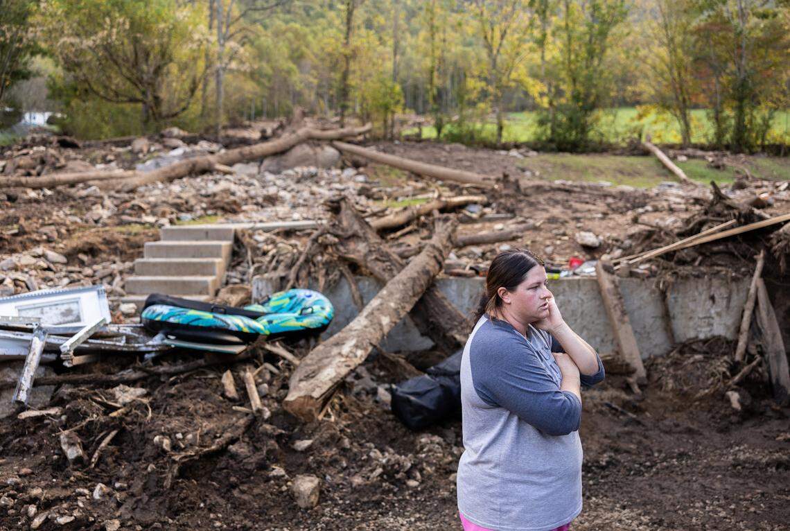 Kelli Ball stands in a spot next to her home in Barnardsville, N.C. where a landslide came through in late September.