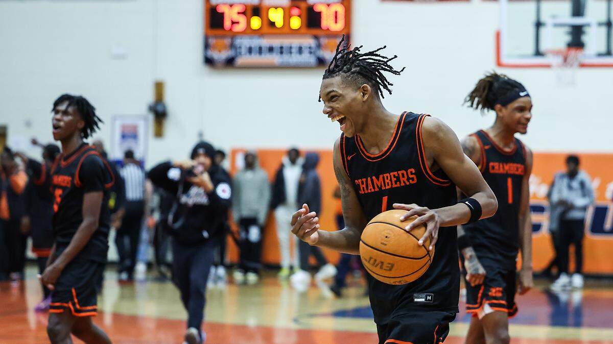 Chambers Cougars Tarris Bouie III celebrates the win against the North Mecklenburg Vikings at Julius L. Chambers High School in Charlotte, N.C., on Friday, February 21, 2025.