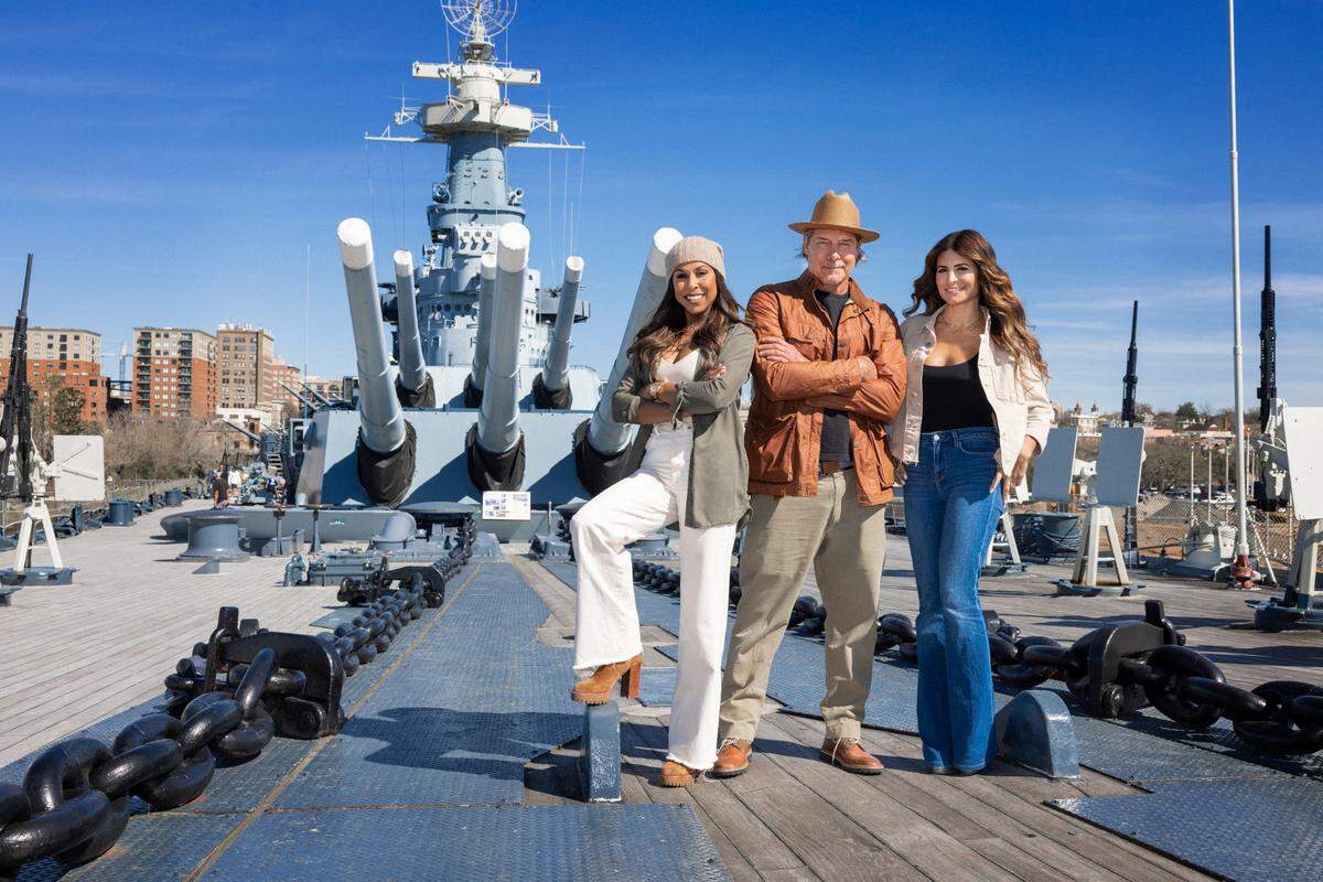 Mentors Taniya Nayak, Ty Pennington and Alison Victoria pose on the USS North Carolina Battleship, as seen on Battle on the Beach, Season 4.