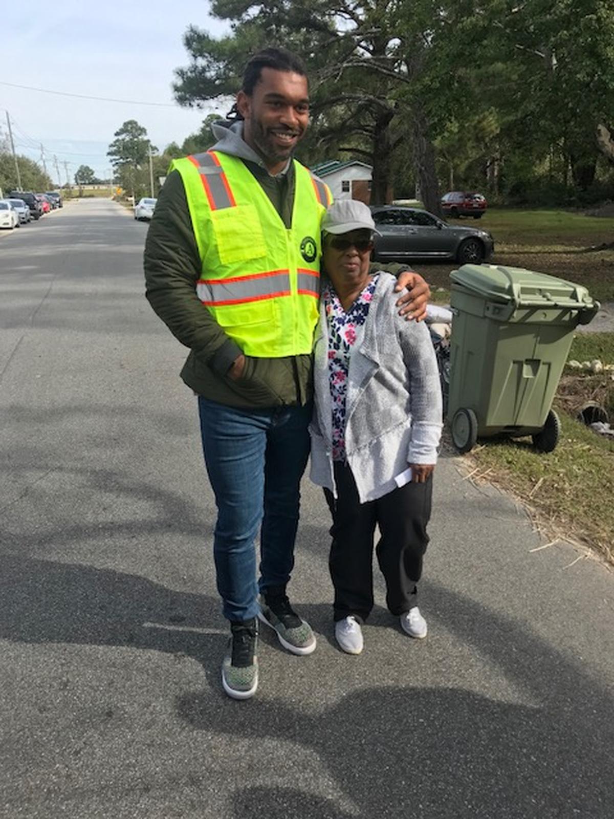 Carolina Panthers defensive end Julius Peppers meets Helen Hayes, a woman whose house got mucked and gutted by United Way and Americorps on Tuesday. Peppers is a part of the Hurricane Florence relief efforts in partnership with the volunteers.