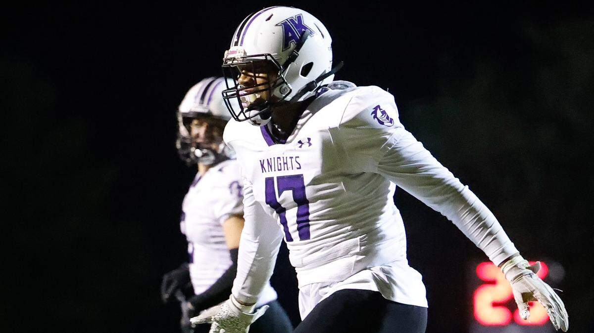 Ardrey Kell (in white) faced Myers Park Thursday in a high school football game moved up a day due to Hurricane Ian