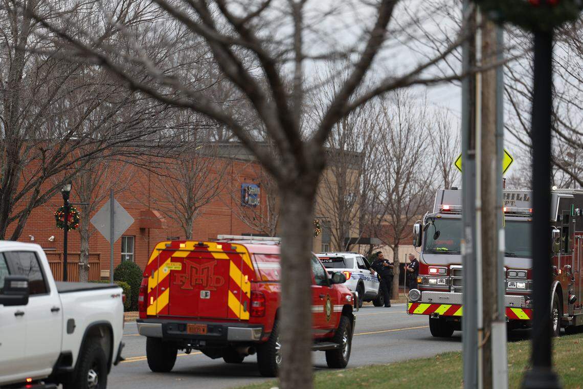 CMPD and Mint Hill fire department respond to authorities respond to a shooting at a shopping center Friday, Dec. 26, 2025. Two officers were shot, and a suspect is dead, officials said.