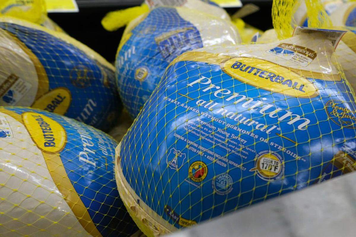 NEW YORK, NEW YORK - NOVEMBER 14: Frozen turkeys are displayed for sale inside a grocery store on November 14, 2022 in New York City. The price of turkeys, a staple for many Americans at Thanksgiving, is at record highs this year due to inflation and a rise in the price of feed among other cost issues. (Photo by Spencer Platt/Getty Images)
