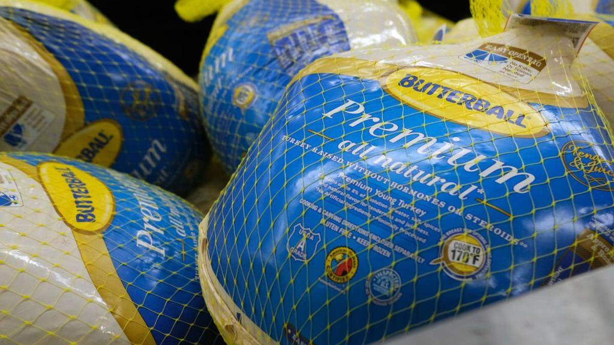NEW YORK, NEW YORK - NOVEMBER 14: Frozen turkeys are displayed for sale inside a grocery store on November 14, 2022 in New York City. The price of turkeys, a staple for many Americans at Thanksgiving, is at record highs this year due to inflation and a rise in the price of feed among other cost issues. (Photo by Spencer Platt/Getty Images)