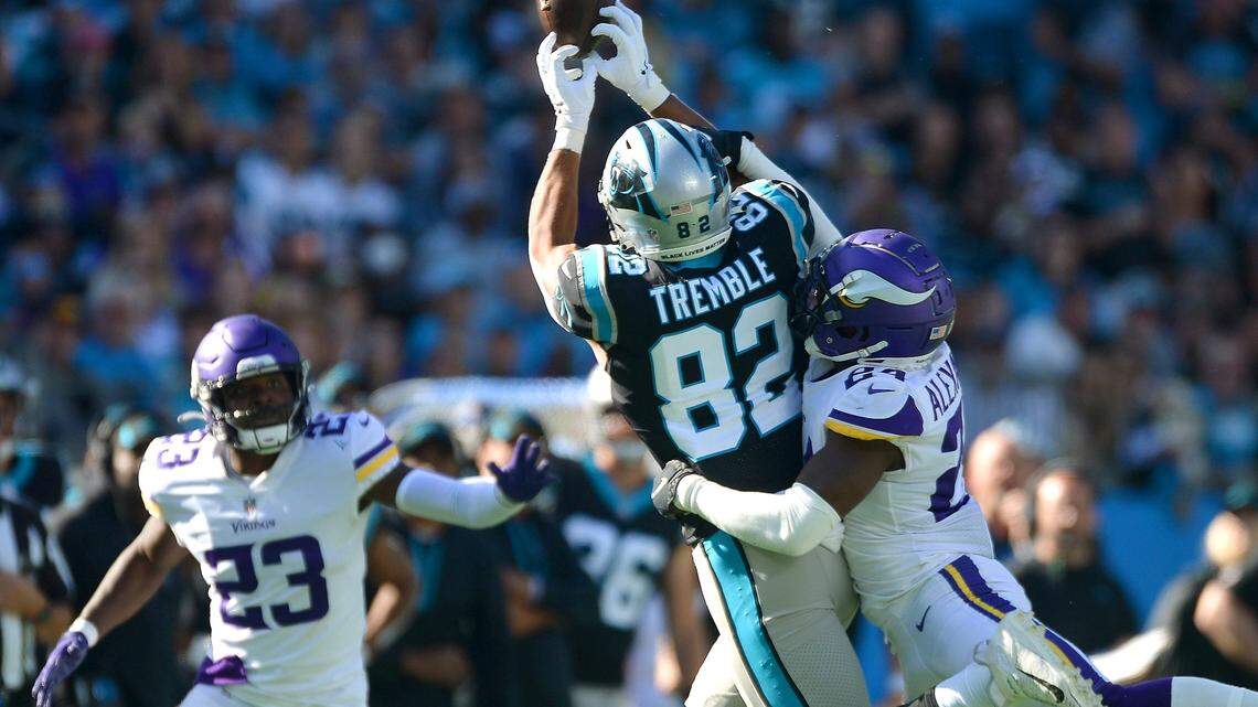 Carolina Panthers tight end Tommy Tremble, center, is unable to make a pass reception as the Minnesota Vikings defense applies pressure during third quarter action at Bank of America Stadium in Charlotte, NC on Sunday, October 17, 2021. The Vikings defeated the Panthers 34-28.