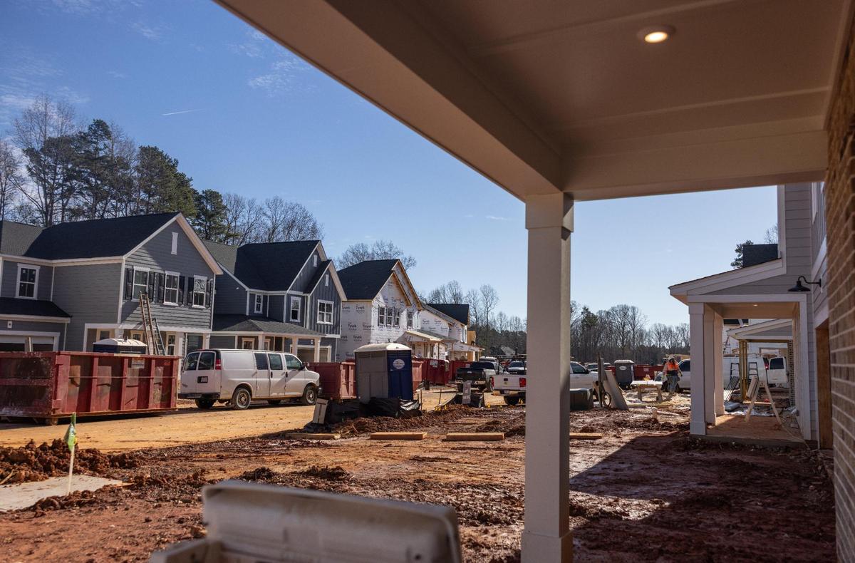 Workers are continuing progress for a subdivision being built by Tri Pointe, a Nevada-based company.