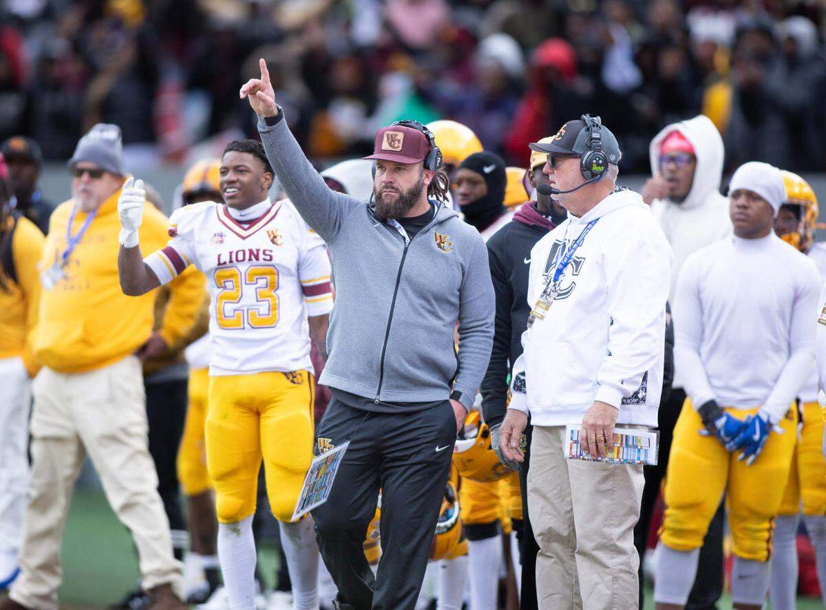 Head coach Sam Greiner (center) looks on as his leads going into the 4th quarter. West Charlotte would defeat Seventy-First 17-14 in the NCHSAA 3A state championship game at Carter Finley Stadium Saturday December 21, 2024.