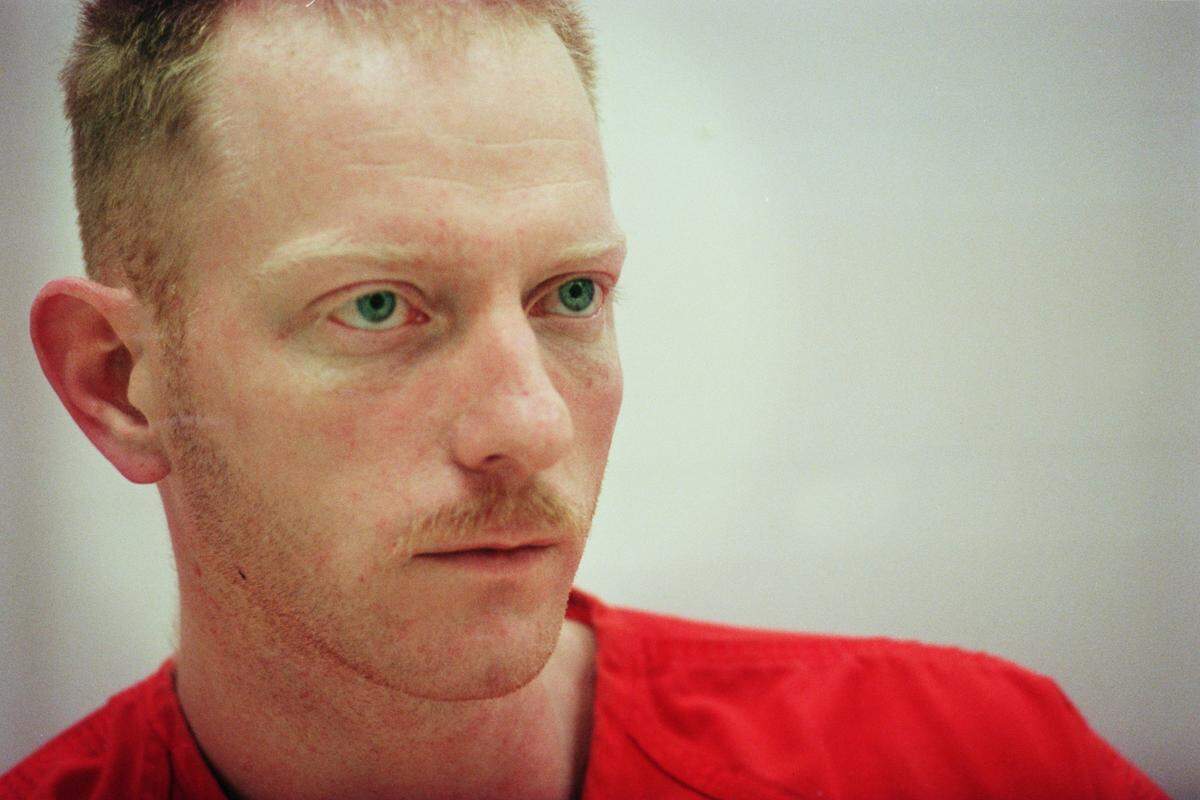 Former Loomis Fargo employee David Ghantt, shown at the Mecklenburg County jail in April 1999, has paid just under $50,000 of the $3.81 million in restitution he was ordered to pay, according to federal court officials.