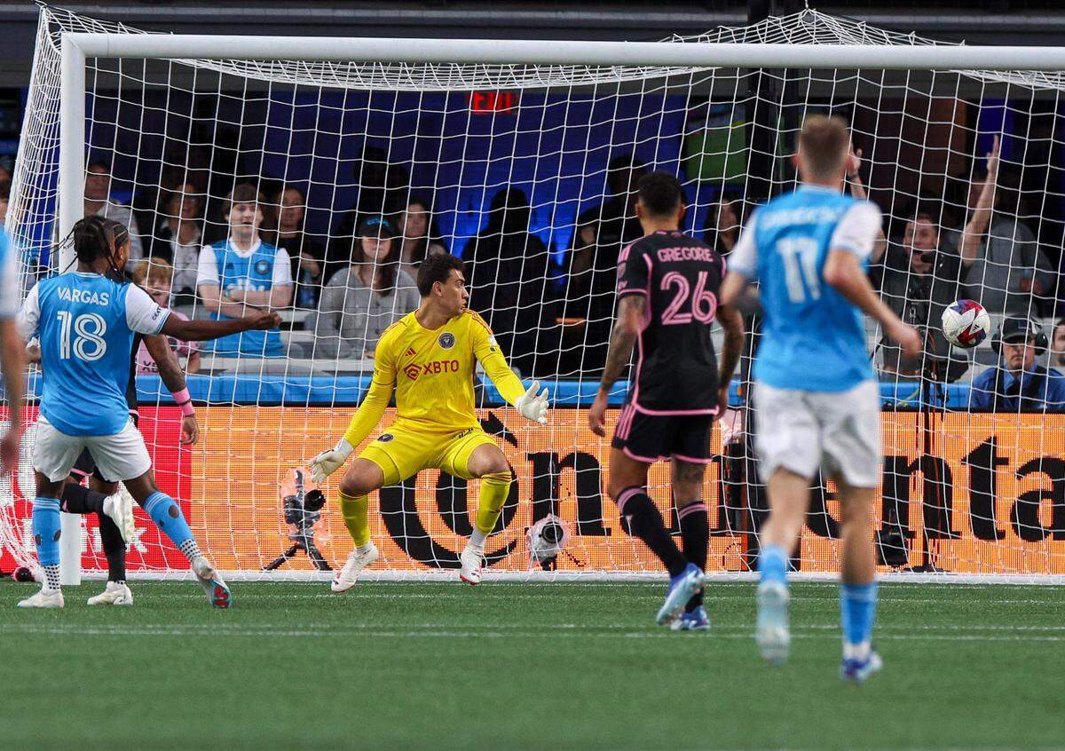 Charlotte FC forward Kerwin Vargas, left, watches as his kick flies past Inter Miami’s goalie and into the net during the match at Bank of America Stadium on Saturday, October 21, 2023 in Charlotte, NC. Charlotte FC held onto their lead to defeat Inter Miami, 1-0, clinching a spot in the playoffs.