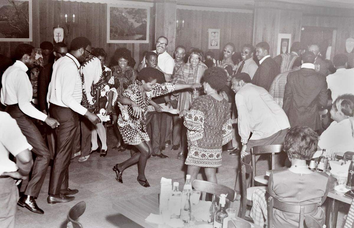 Charlotte’s Excelsior Club members dancing. Shawn Kennedy, a local businessman is working to reopen the club.