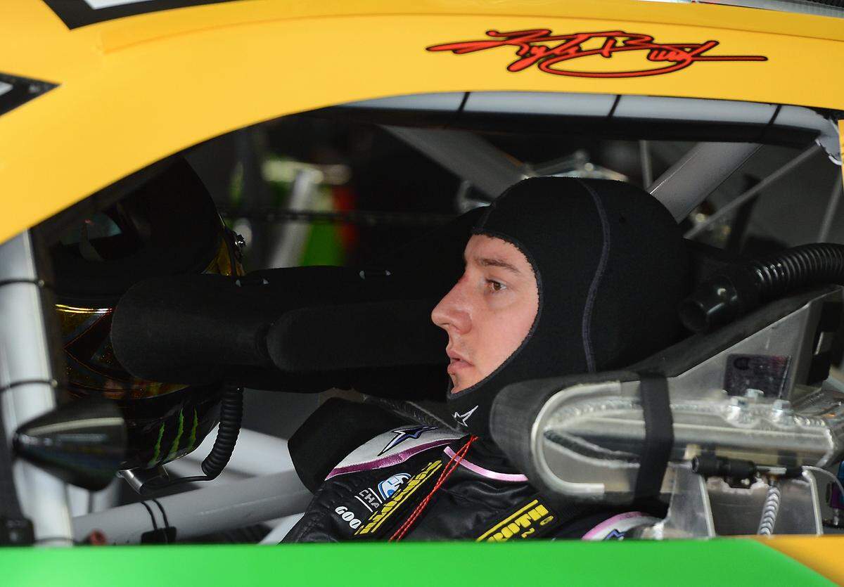 NASCAR Sprint Cup Series driver (18) Kyle Busch waits in his car for the start of practice on Thursday, October 10, 2013 at Charlotte Motor Speedway in Concord, NC. Jeff Siner - jsiner@charlotteobserver.com