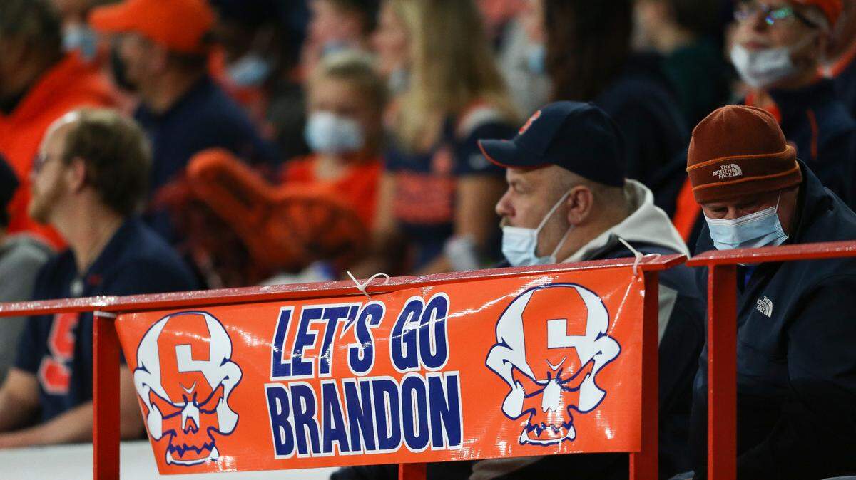 A sign reading “Let’s Go Brandon” is displayed at an NCAA college football game in Syracuse, N.Y. on Oct. 30, 2021. “Let’s Go Brandon” is a coded criticism of President Joe Biden that has gone viral.