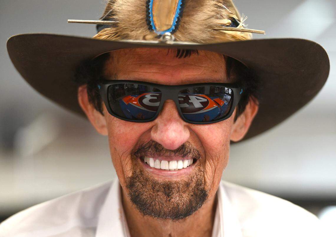 The iconic #43 of former NASCAR driver and Hall of Fame member Richard Petty is reflected in his sunglasses as he poses inside The Richard Petty Museum in Level Cross, NC on Monday, January 29, 2024. Petty nicknamed “The King,” was the first driver to win the championship 7 times while recording 200 racing wins.