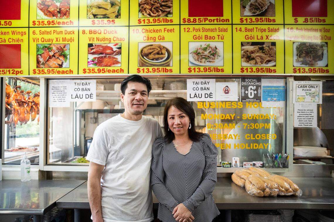 Thanh Son Nguyen, left, and his wife, Lan Anh Vo, own Van Loi in Charlotte.