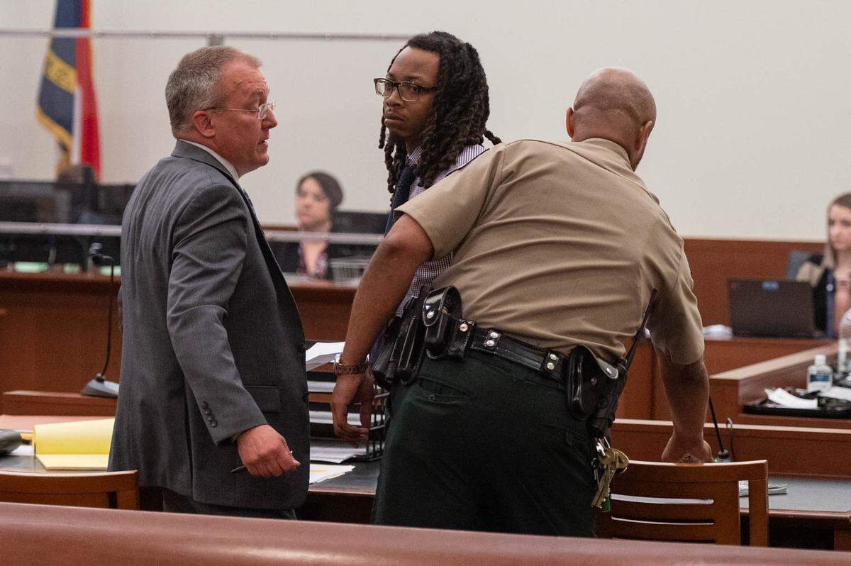 James Payne, center, pleaded guilty to involuntary manslaughter Thursday for the 2022 crash that killed two Charlotte women.