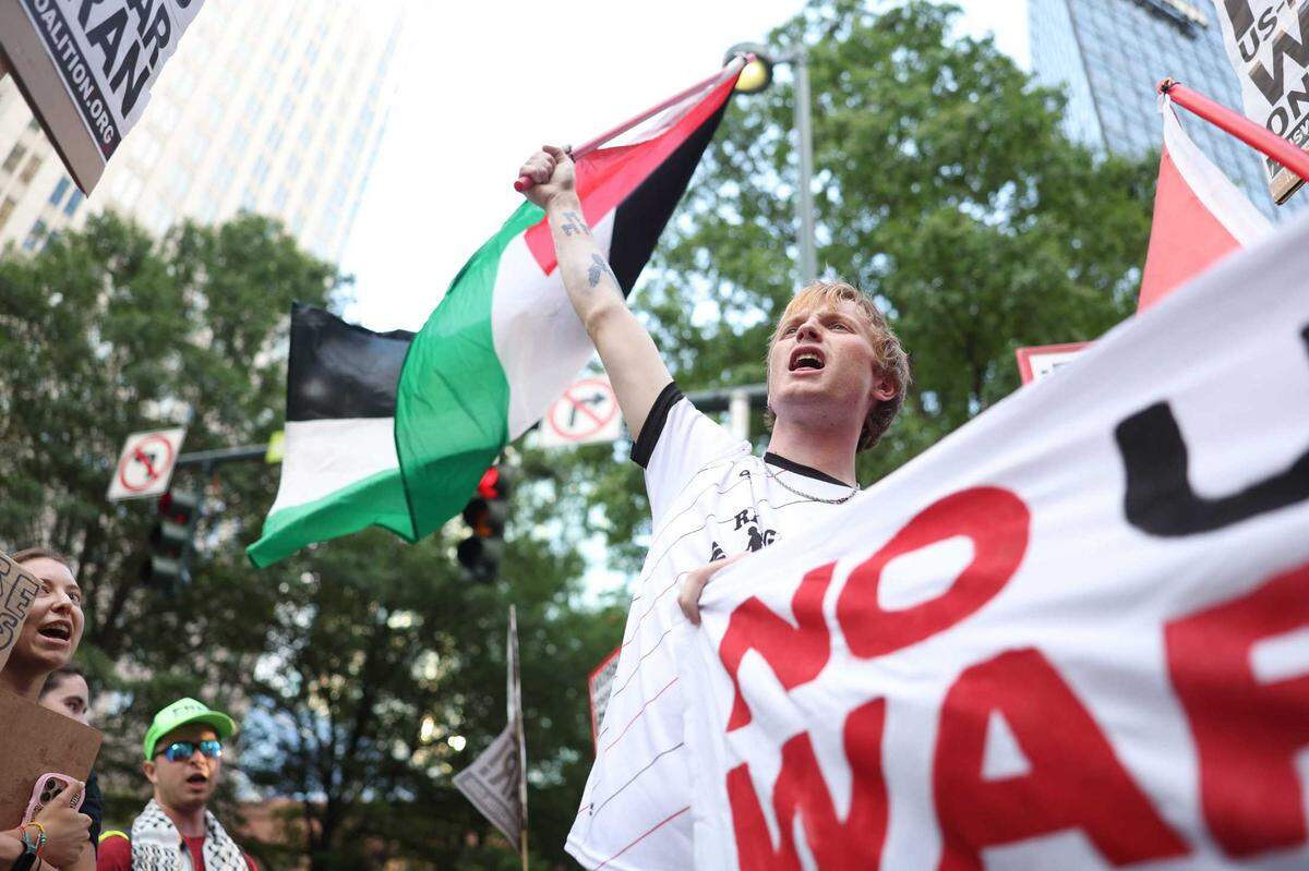 ‘No War on Iran!’ protest against war in the Middle East with an attack on Iran at Romare Bearden Park in Charlotte Thursday, June 26, 2025