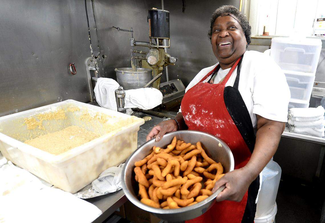 Delia Livsey has been in charge of making the hushpuppies at Red Bridges Barbecue Lodge in Shelby, NC for 30-40 years. She is affectionately known as the “Hushpuppy Queen.”