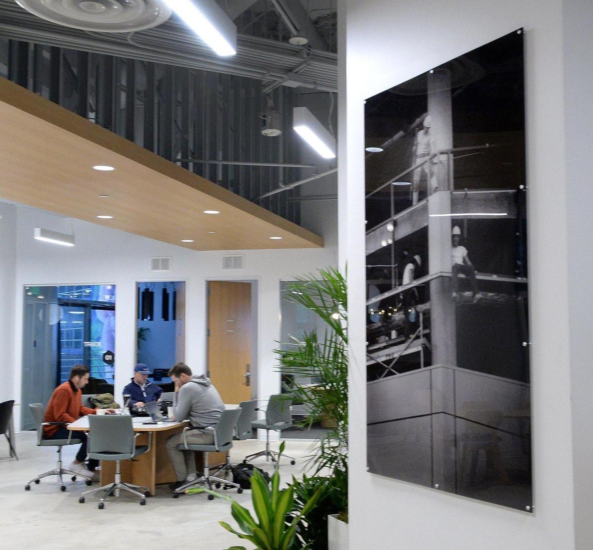 The One Independence Center Collaborative Lounge displays photos from the original construction of the building. 