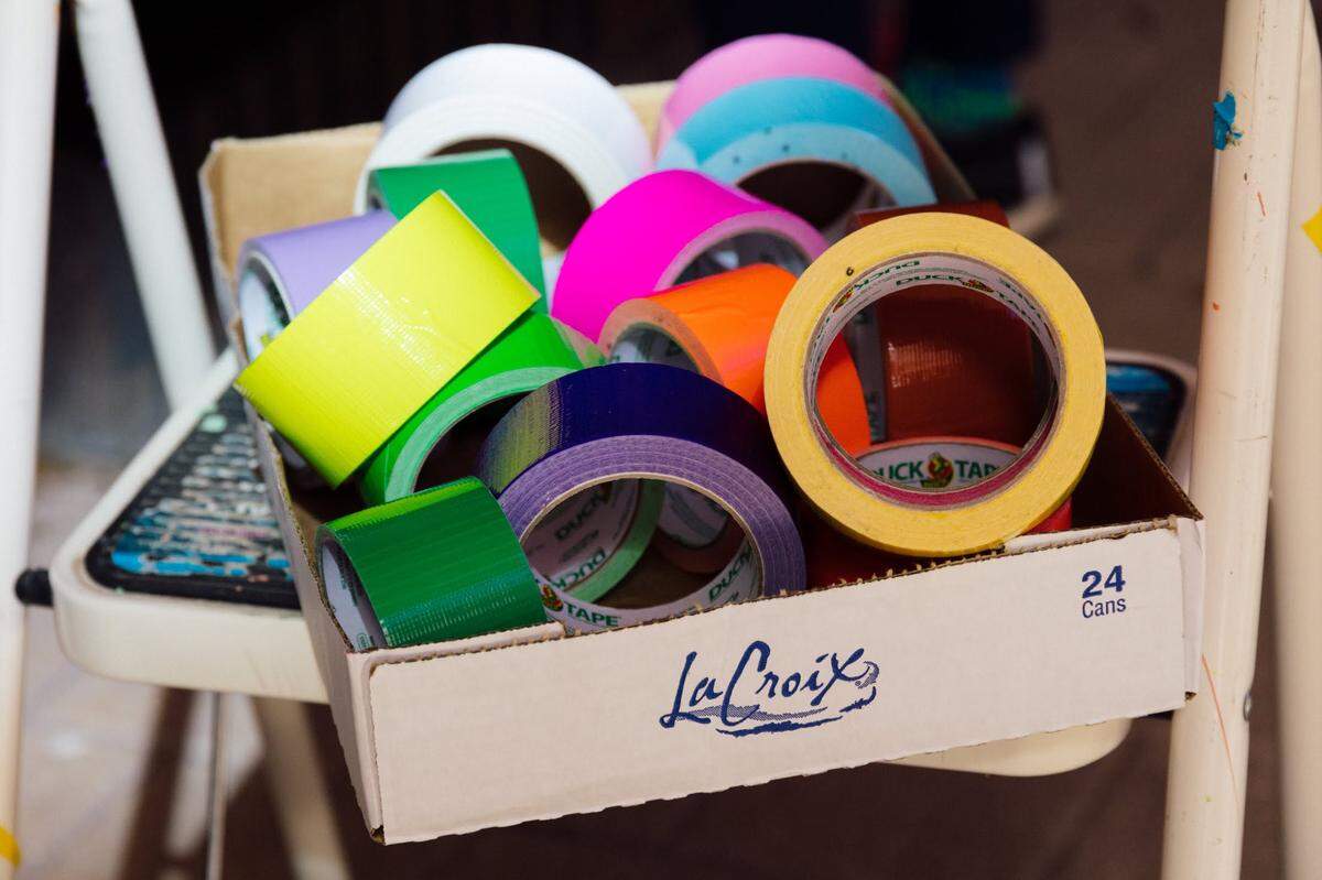 Some of the tape that artist Mary Carter Taub used to create a tape installation on the doors and windows of Hodges Taylor’s new location in South End.