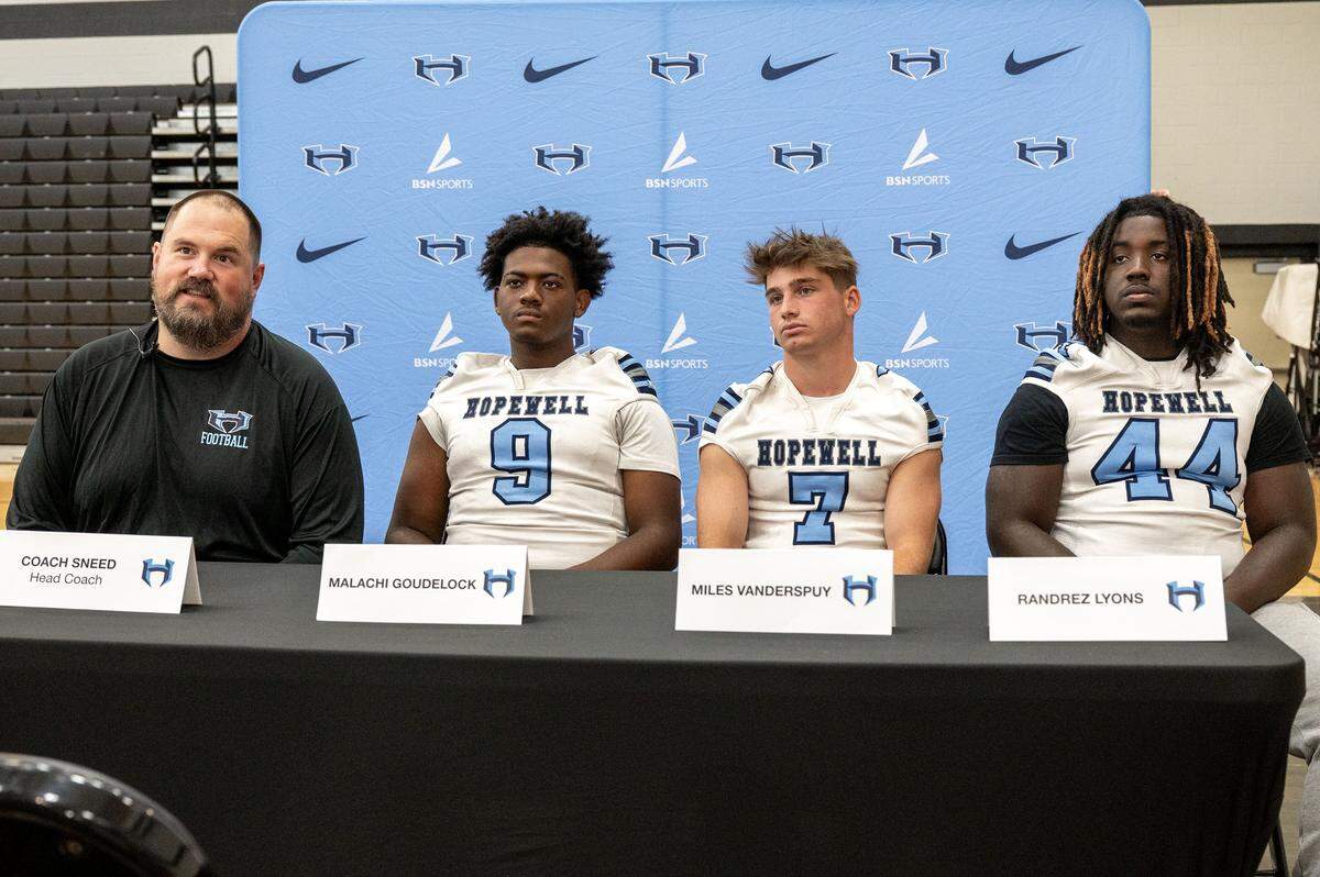 Hopewell football coach Brandon Sneed speaks about the upcoming season during the Greater Charlotte high school football conference's media day at Rocky River High School in Charlotte, NC, Tuesday July 29, 2025.