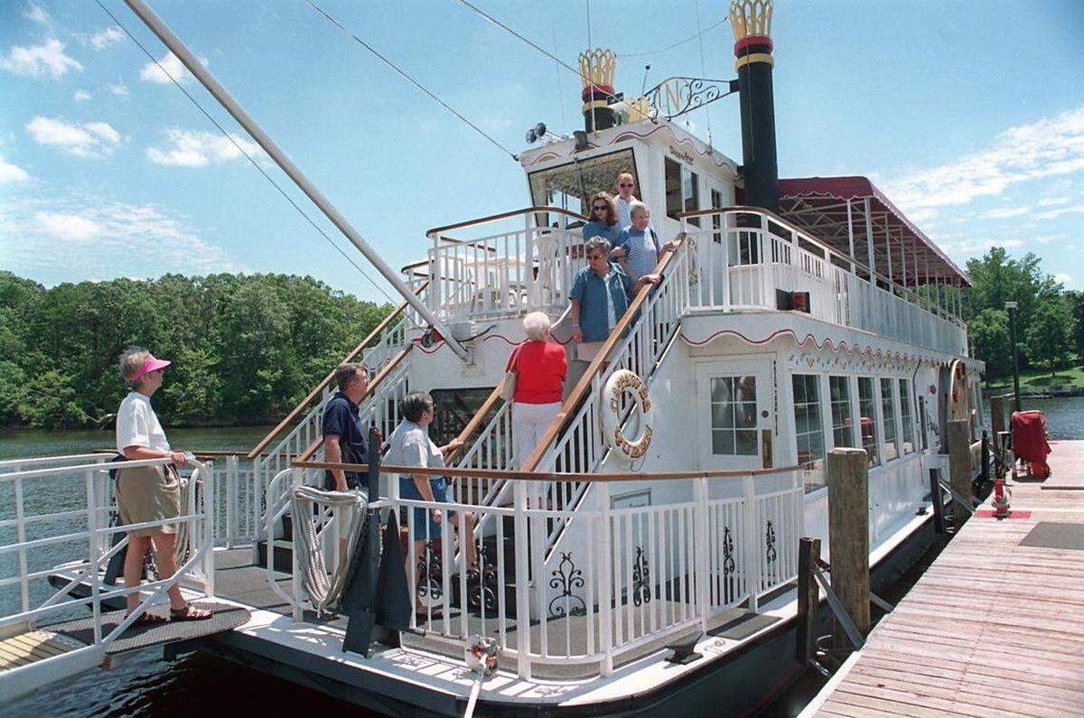 In this August 1998 file photo, passengers board the Catawba Queen sightseeing boat in Mooresville for a ride on Lake Norman.