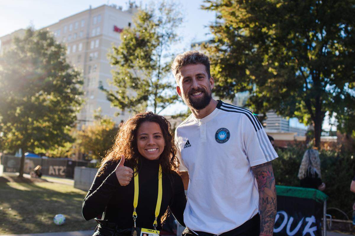 Charlotte FC player liason Elena Lemus with center-back Guzmán Corujo prior to the Mexico-Ecuador friendly at Bank of America Stadium in Charlotte, N.C. on Oct. 27, 2021.
