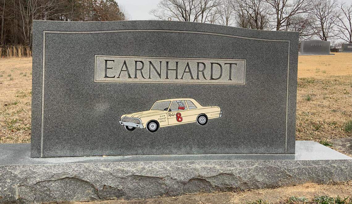 Ralph Earnhardt’s headstone includes artwork depicting his No. 8 race car. It was Ralph Earnhardt, a successful short-track racer, who taught Dale Earnhardt about cars in the family garage in Kannapolis.