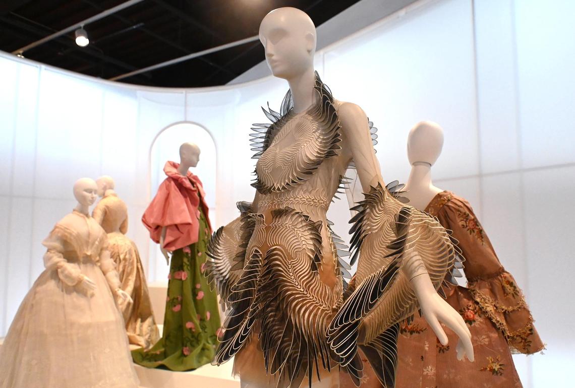 The Mint Museum’s newest exhibit is "Fashion Reimagined: Themes and Variations, 1760-NOW." It celebrates 50 years since the founding of the museum’s fashion collection. The “Labyrinthine” dress from “Sensory Seas” collection, center, is among the dresses exhibited.