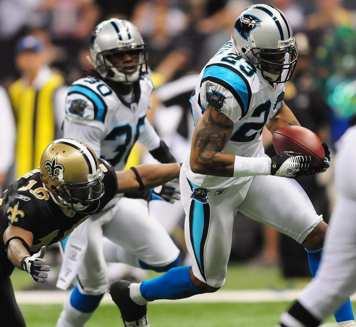 Carolina Panthers cornerback Dante Wesley (23) runs toward the end zone after picking up a fumble on a New Orleans kickoff return in 2008. Wesley’s TD was key in a 33-31 Panthers win and was the only touchdown of his nine-year NFL career.
