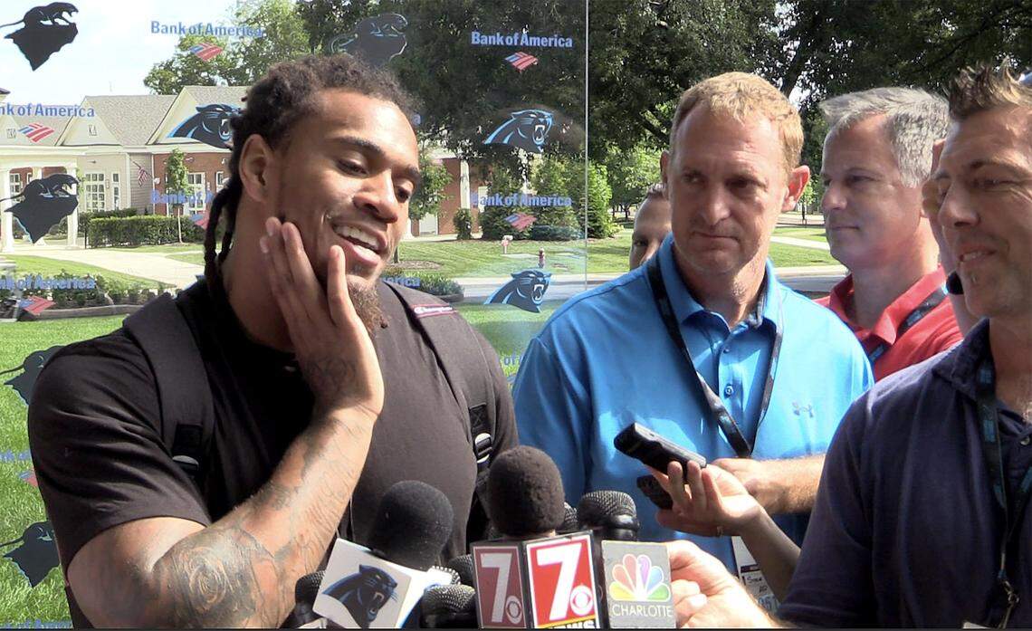 Carolina Panthers linebacker Shaq Thompson, left, talks to the media on Wednesday, July 25, 2018 about his seeing the number 54 everywhere. Thompson wears number 54.