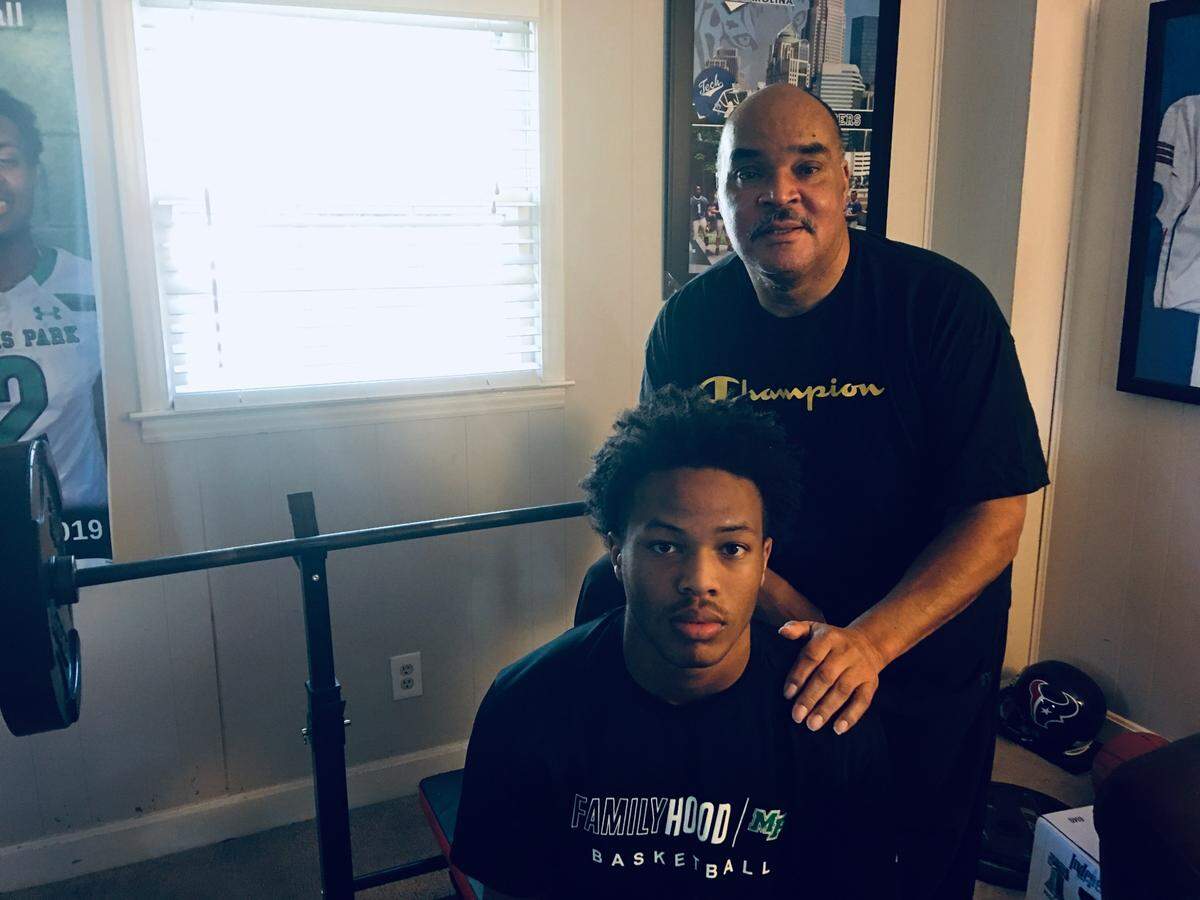 Jacob Newman is a running back/point guard on the Myers Park High boys basketball and football teams. His father, Tim, was a star at Olympic High and JC Smith