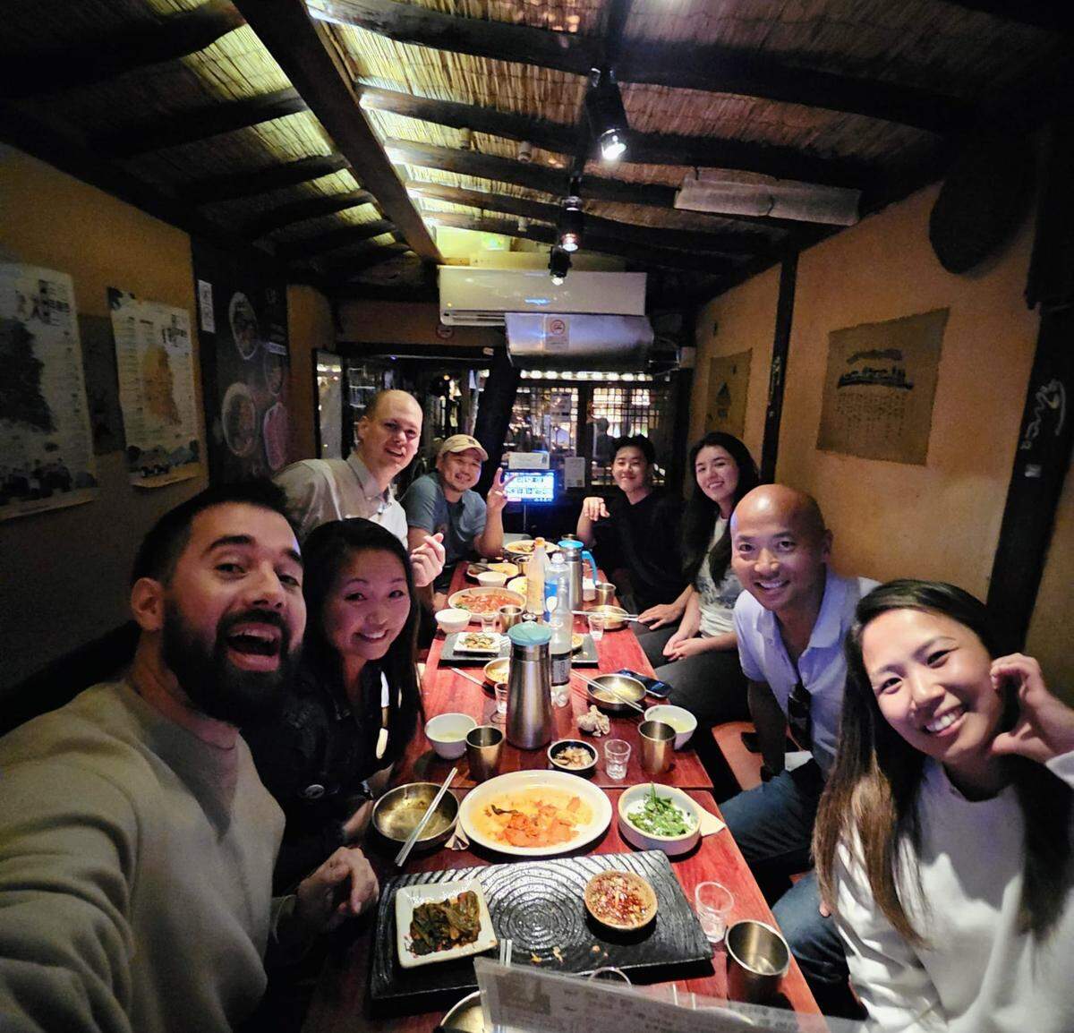 Théoden Janes, second from right, with friends at dinner after the makgeolli-making class.