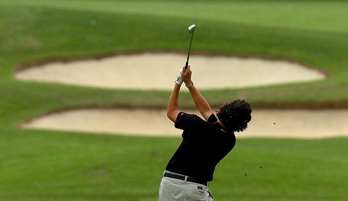 In this photo from May 2006, Daniel Meggs represents Butler High School as he hits his shot up onto the 15th green, during the N.C. 4A Western Regional at Carmel Country Club