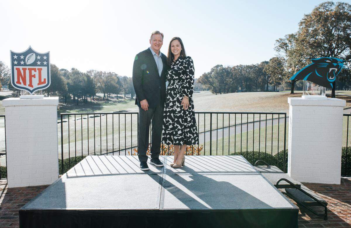 Cameron Hutchinson, the Director of Partnerships Success and Strategy for the Carolina Panthers, is pictured with NFL commissioner Roger Goodell during his stop in Charlotte in the 2023 season.