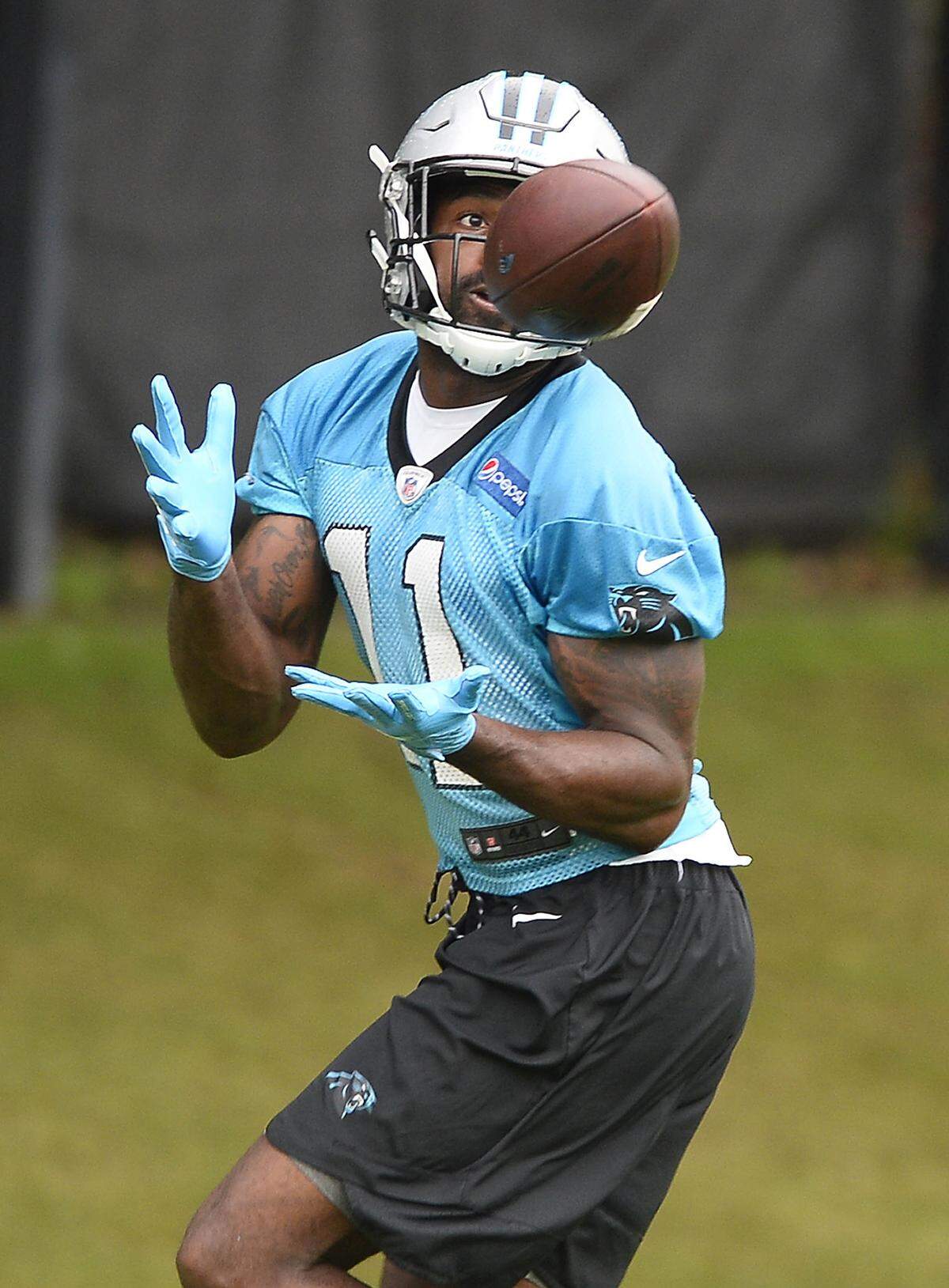 Carolina Panthers wide receiver Torrey Smith (11) makes a reception during organized team activities on Tuesday. After practice, he discussed social justice issues in the NFL and how a "false narrative" has made villains out of protesters.