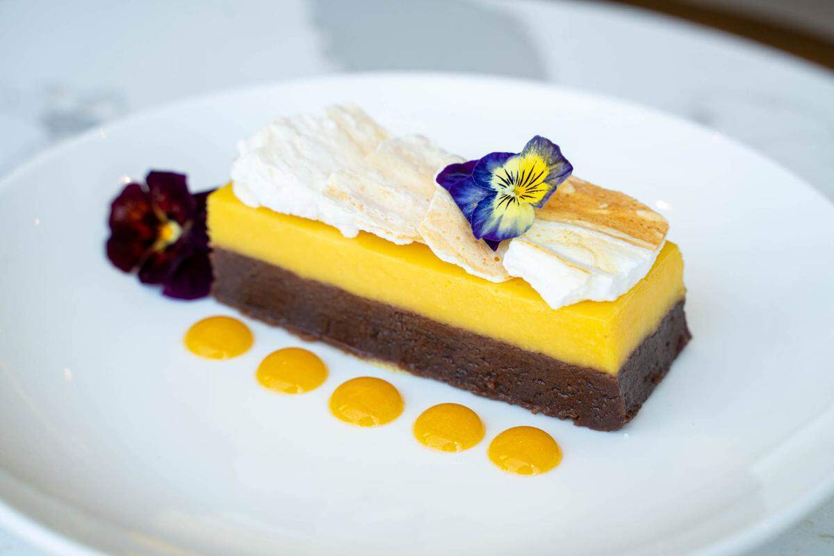 IRO’s desserts include a Passionfruit Mousse Cake atop a brownie with passionfruit coulis and meringue.