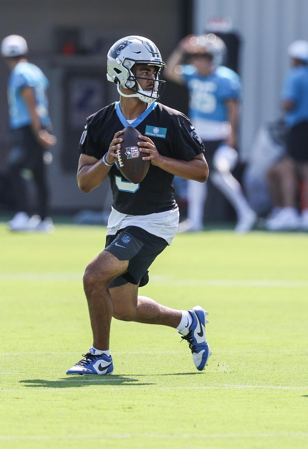 Panthers quarterback Bryce Young runs through a passing drill during training camp in Charlotte, NC on Wednesday, July 24, 2025.