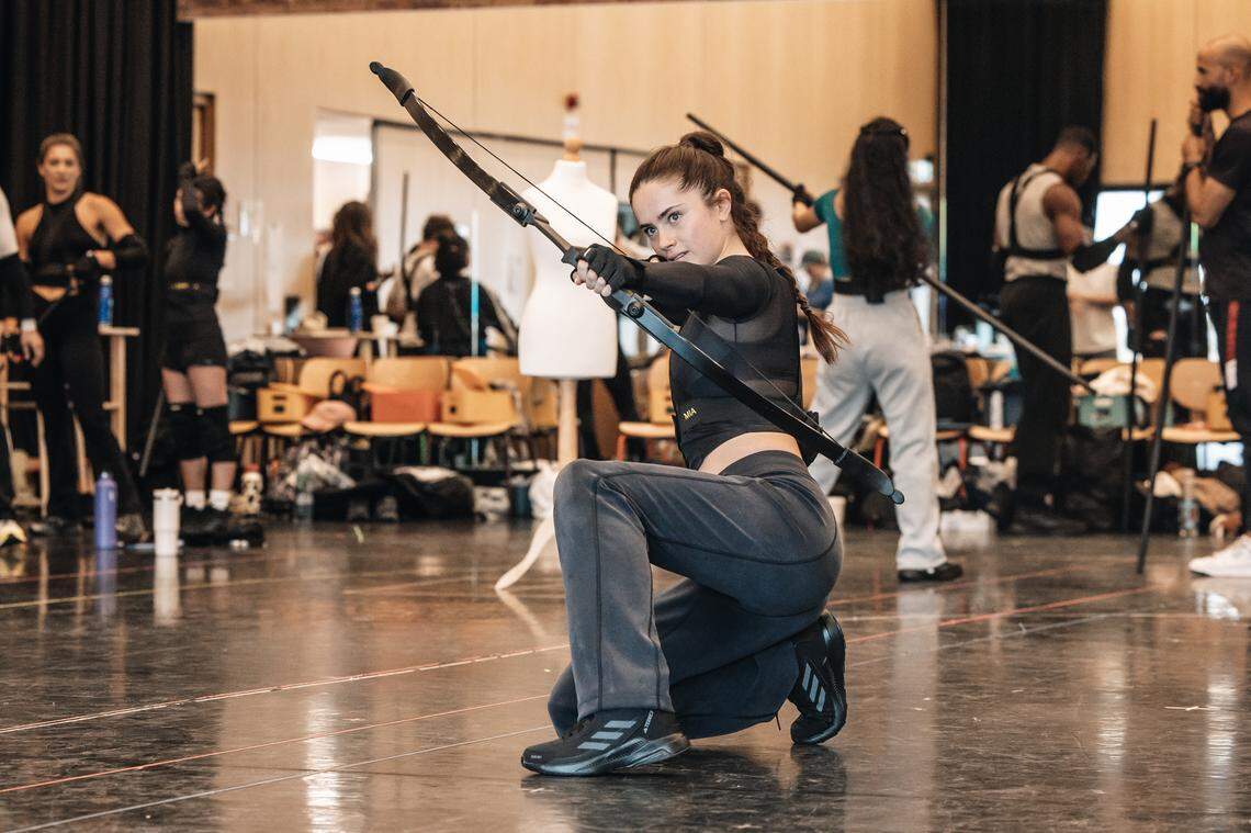 Mia Carragher as Katniss Everdeen, in rehearsal for “The Hunger Games: on Stage” in London. The immersive show has caught the attention of Blumenthal Arts.