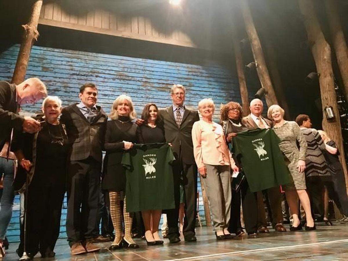 Charlotte native Guy Gullick was a pilot for U.S. Airways on Sept. 11, 2001, flying a plane from Rome to Philadelphia. His plane was diverted to Gander, Newfoundland, that day. Gullick is center with other crew members who were rerouted that day. They are on the “Come From Away” stage on Broadway in New York City.