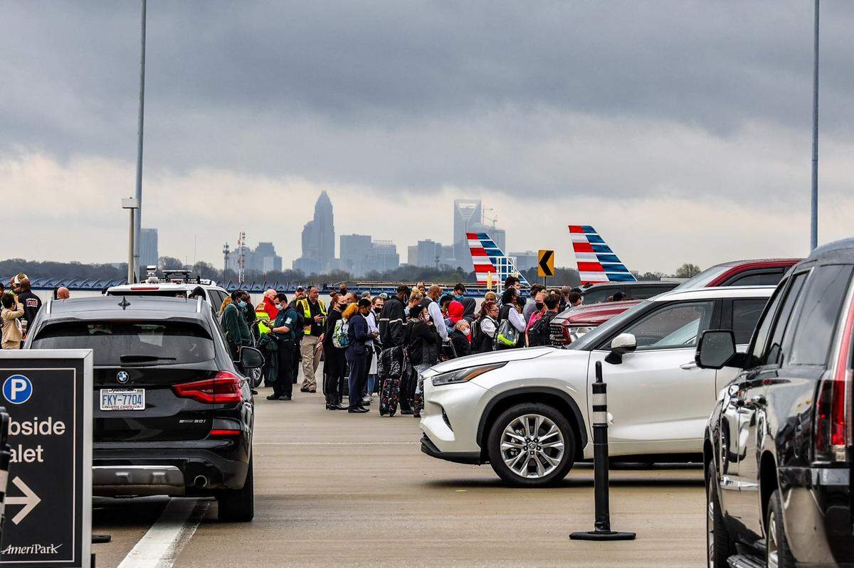 Charlotte Fire crews responded to a kitchen fire at Charlotte Douglas International Airport Wednesday as some passengers were evacuated.