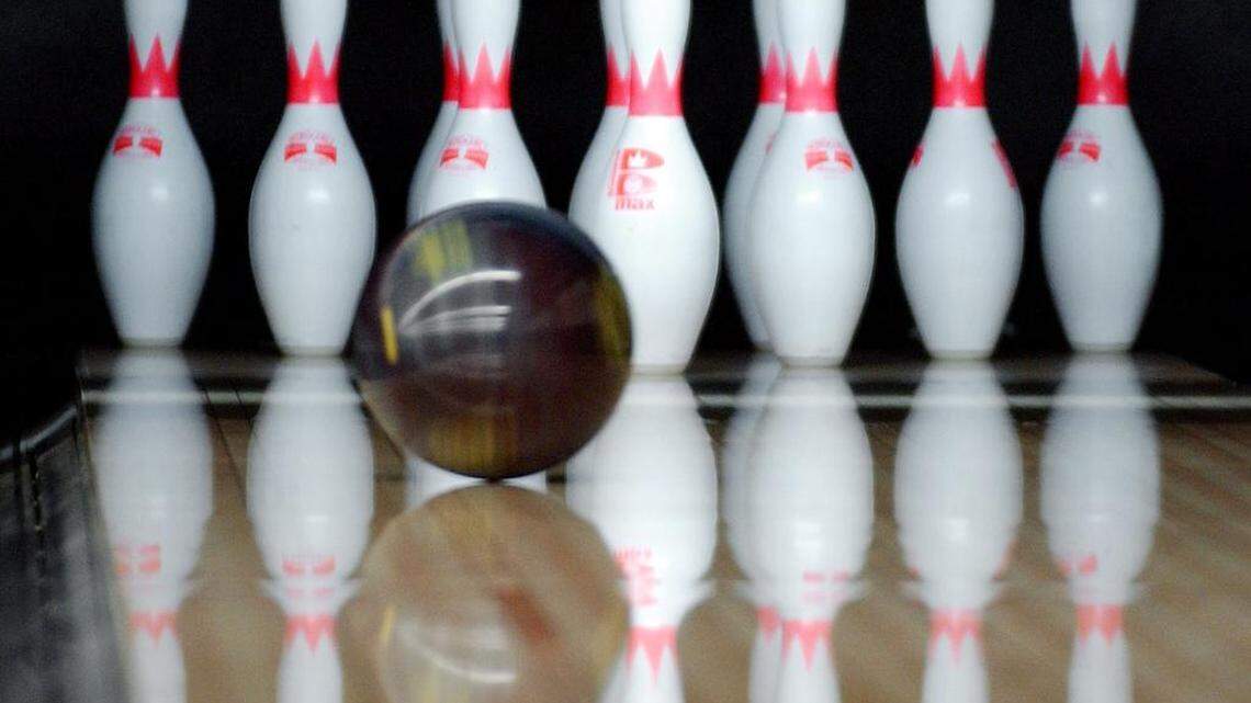 An off-duty deputy was bowling when his pistol accidentally discharged, grazing a child with shrapnel on Friday night, the Iredell County Sheriff's Office said .