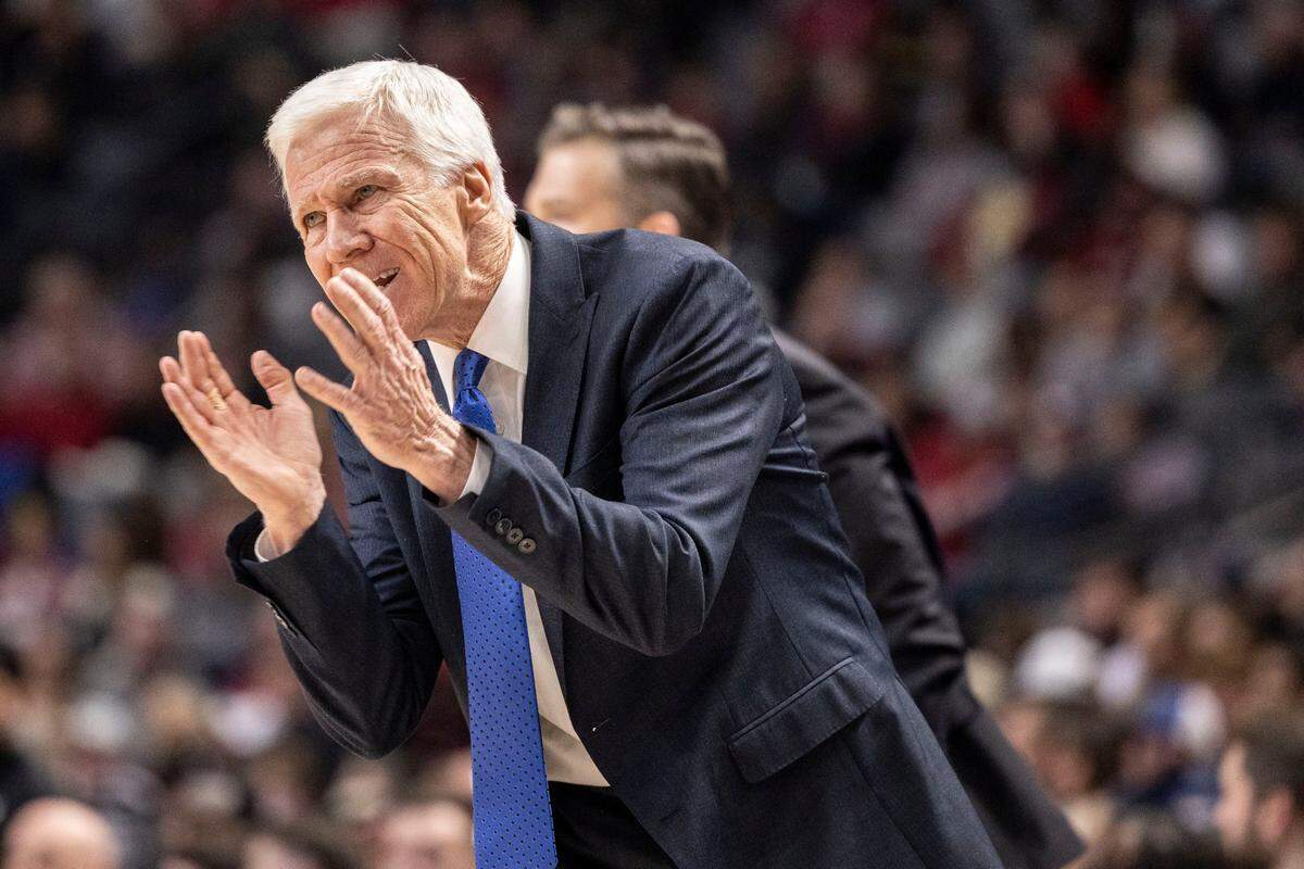 Davidson head coach Bob McKillop cheers his team during the first half of an NCAA college basketball game against Alabama, Tuesday, Dec. 21, 2021, in Birmingham, Ala. (AP Photo/Vasha Hunt)